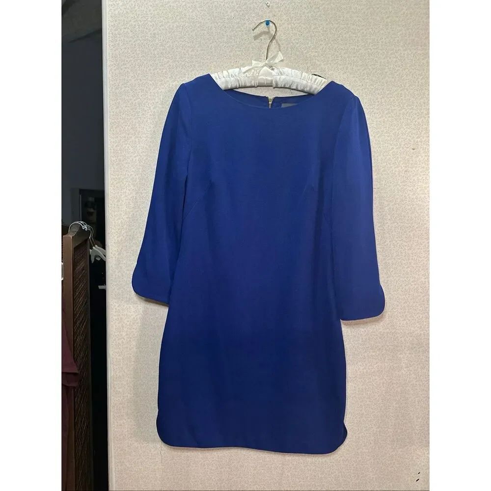 Like new Vince Camuto mini dress with gold zipper on the back